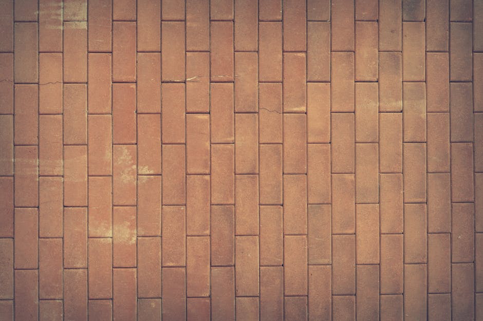 A solid red brick wall representing structural integrity